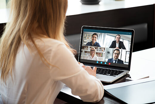 Back,View,Of,Businesswoman,Speak,Using,Webcam,Conference,On,Laptop Back,View,Of,Businesswoman,Speak,Using,Webcam,Conference,On,Laptop